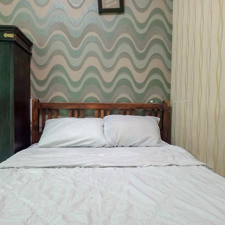 Trihakso Guest House Near Kaliurang Redpartner 斯勒曼 外观 照片